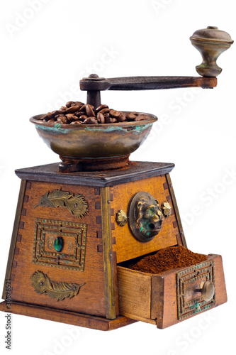 Photo: Kaffee. Kaffeebohnen und Kaffeemühle Kaffee. Kaffeebohnen und Kaffeemühle