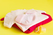 pile of pink baby clothes