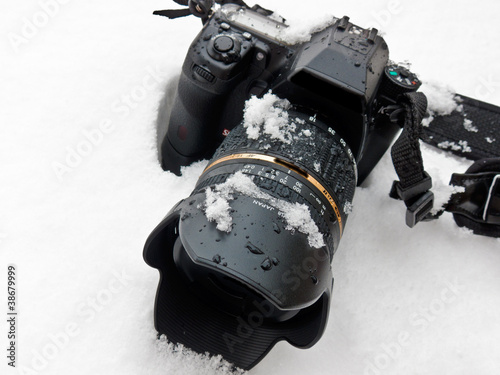 Photo: Camera And Lens In Snow Camera And Lens In Snow