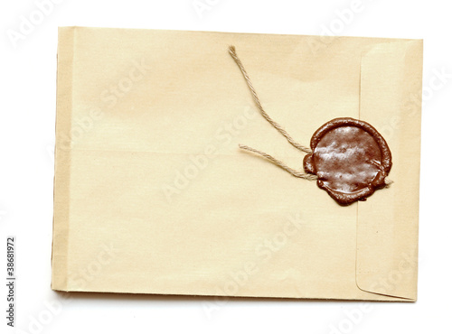Photo: red wax seal on yellow envelope red wax seal on yellow envelope