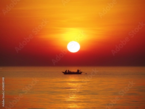 Photo: Sunset with Fishing boat Sunset with Fishing boat