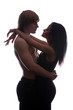 Portrait of happy young couple hugging