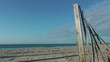 Beach dune fence leading to seashore