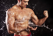 Photo: muscular man having shower muscular man having shower