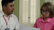 Video: Latino Salesman Talking to Mature Caucasian Woman Latino Salesman Talking to Mature Caucasian Woman
