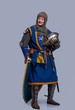 Medieval knight on grey background.