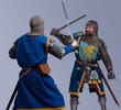 Two medieval knights fighting.