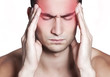 Photo: Men having a migraine isolated on white Men having a migraine isolated on white