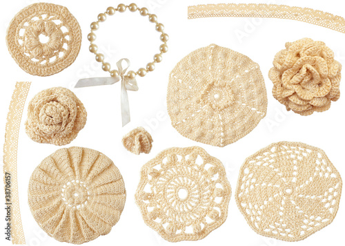 Photo: set of crochet handmade motifs isolated on white set of crochet handmade motifs isolated on white