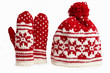 winter cap and mittens with knitted motifs. on white