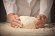 hands kneading bread dough hands kneading bread dough