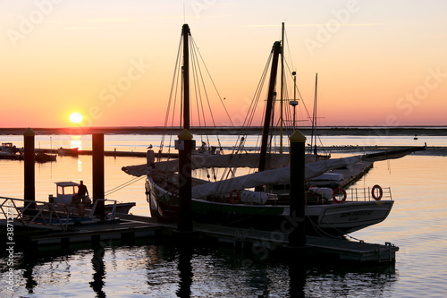Photo: Sunrise in Ria Formosa, conservation park. Algarve. Portugal Sunrise in Ria Formosa, conservation park. Algarve. Portugal