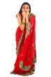 Young Indian girl with a terrified expression.
