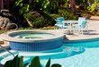 Pool and hot tub with table