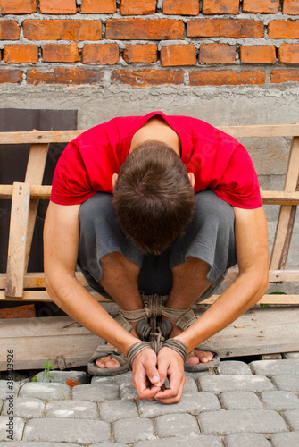 Photo: Man tied up with rope Man tied up with rope
