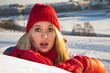 portrait of surprised woman with open mouth, winter
