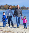 Family of four at the beach