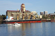Grain elevator & ship (exports).