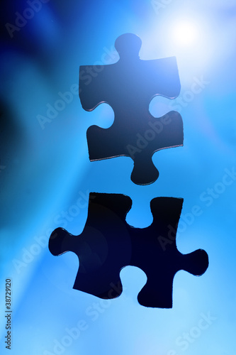 Photo: Zwei Puzzleteile als Sinnbild für Zusammenarbeit Zwei Puzzleteile als Sinnbild für Zusammenarbeit