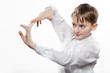Joyful teenager does blow by fingers