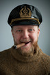 Seaman with a smoking cigar, knit sweater