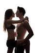 Portrait of happy young couple hugging