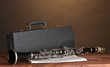 old clarinet, case and notebook with notes old clarinet, case and notebook with notes