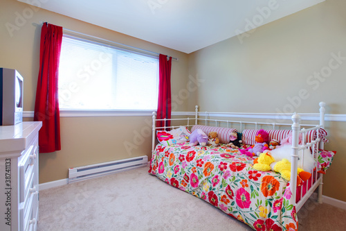 Photo: Kids room with girl flowery bed and to Kids room with girl flowery bed and to