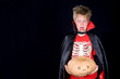 wild boy in halloween- outfit with pumpkin wild boy in halloween- outfit with pumpkin
