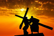 Dragging a wooden cross Dragging a wooden cross