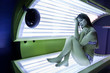 Girl is in a solarium Girl is in a solarium