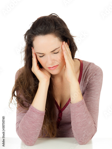 Photo: Attractive young woman with migraine Attractive young woman with migraine