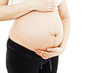 Photo: Pregnant woman isolated on white background Pregnant woman isolated on white background