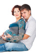 Photo: Portrait of a happy young couple expecting baby isolated Portrait of a happy young couple expecting baby isolated