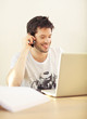 Casual Young Man On Mobile Phone
