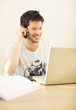 Man Using Mobile And Laptop