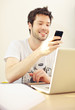 Young Man Reading Text Message