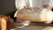 Baker shows fresh-baked bread