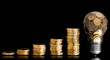 Traditional glass bulb with many golden coins on black Traditional glass bulb with many golden coins on black
