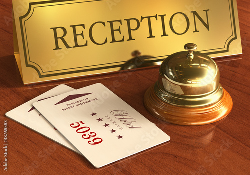 Illustration: Service bell and cardkeys on hotel reception desk Service bell and cardkeys on hotel reception desk