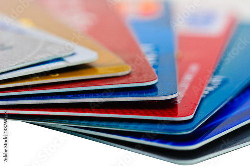 Photo: Credit cards and pen as a background. Credit cards and pen as a background.