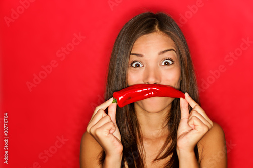 Photo: Chili woman funny on red Chili woman funny on red
