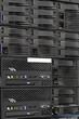 servers stack with hard drives in a datacenter servers stack with hard drives in a datacenter