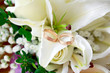 Gold wedding rings on flower