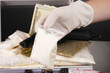 Cocaine and marijuana with gun in a suitcase with hand