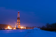 Oil rig in the mist, illuminated at night. Oil rig in the mist, illuminated at night.