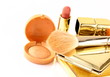 gold make up collection on white background gold make up collection on white background