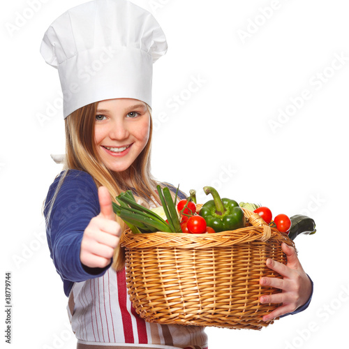 Foto: junior cook with vegetables smiling and thumbs up junior cook with vegetables smiling and thumbs up
