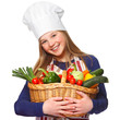 junior cook with vegetables smiling