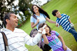 Family playing golf